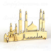 Eid Ramadan Mubarak Mosque Decoration wood cutout centerpiece engraved https://www.simplyimpressions.com/products/eid-mubarak-mosque-decoration-1 Islamic themed Free standing Masjid with palm trees and building. Intricate cut decor in 9 finishes hand painted art festive gift idea for Muslim celebration